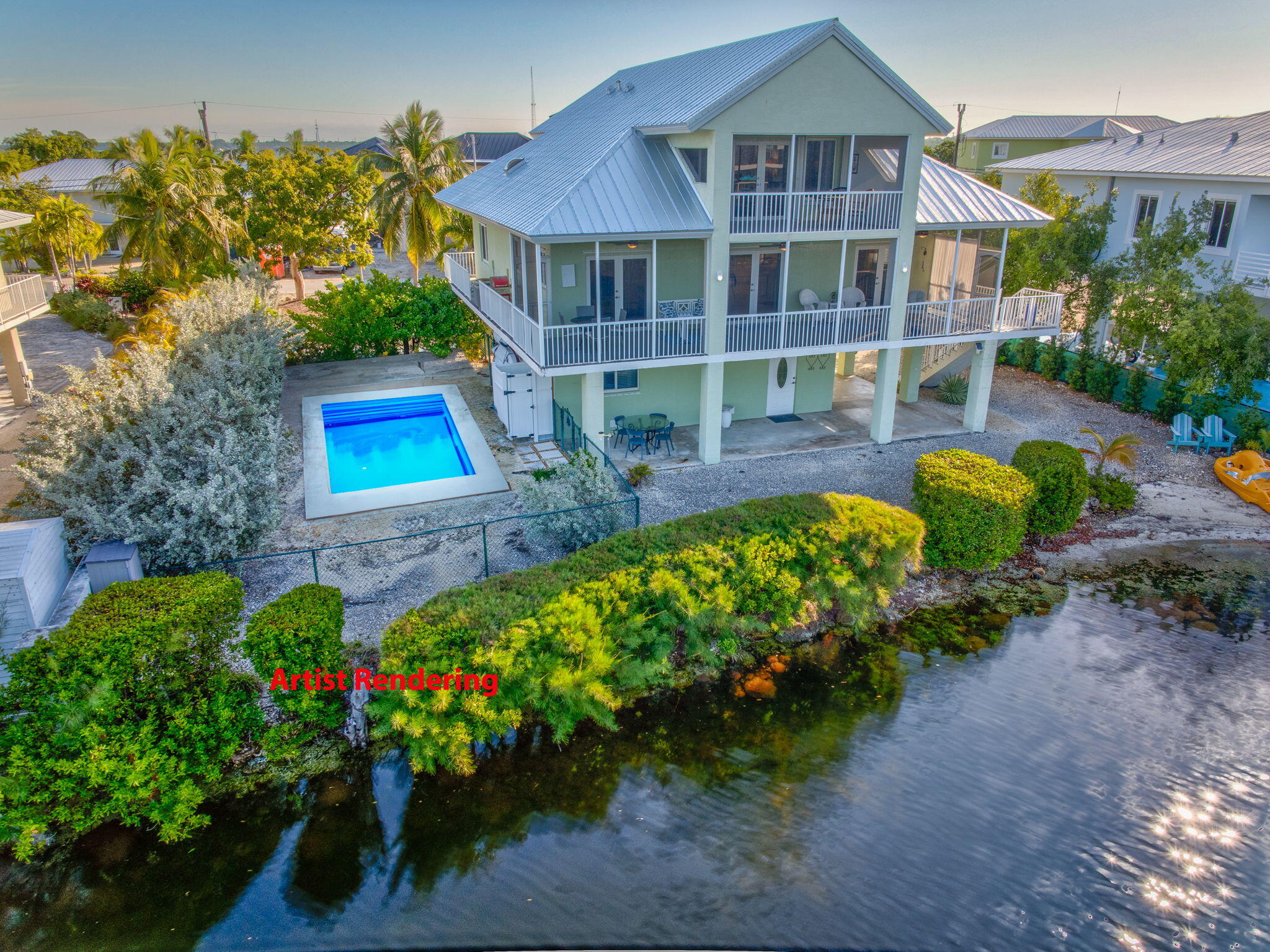 24 Mutiny Place Key Largo, FL 33037 - Photo 41 of 57 a front view of a house with a yard and potted plants