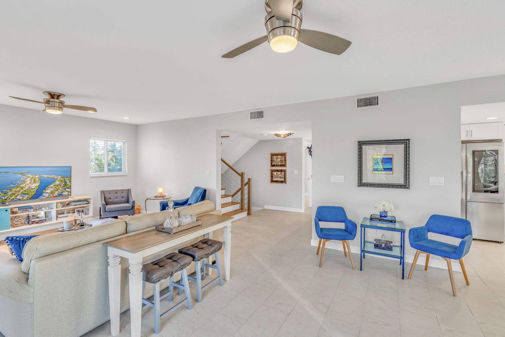 24 Mutiny Place Key Largo, FL 33037 - Photo 7 of 57 a living room with furniture and a wooden floor