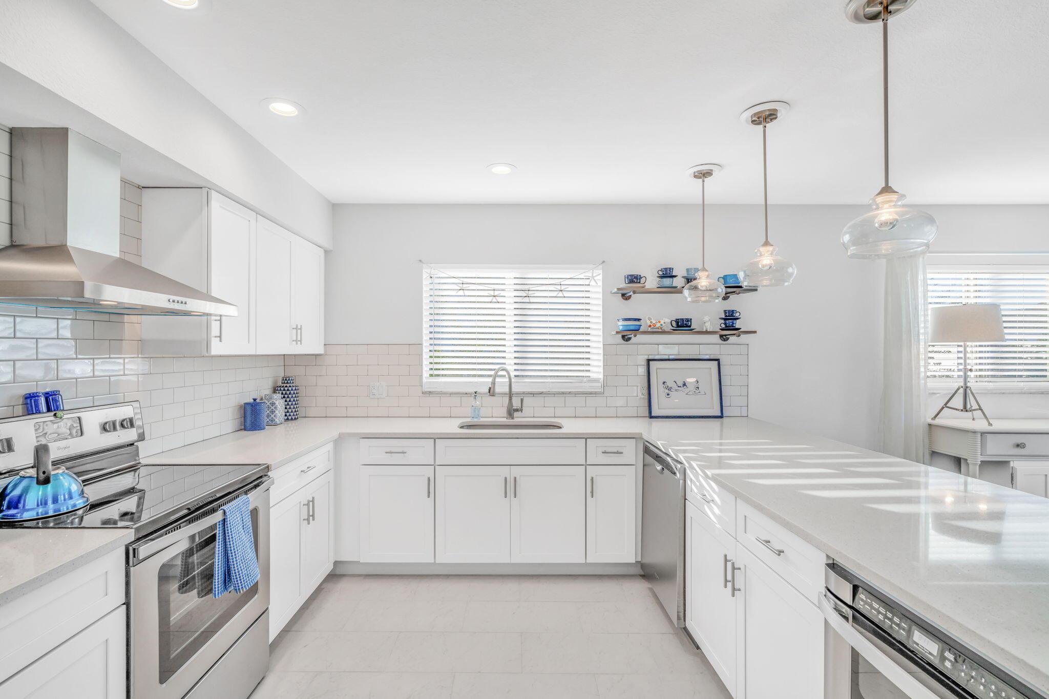 24 Mutiny Place Key Largo, FL 33037 - Photo 9 of 57 a kitchen with a sink stove and cabinets
