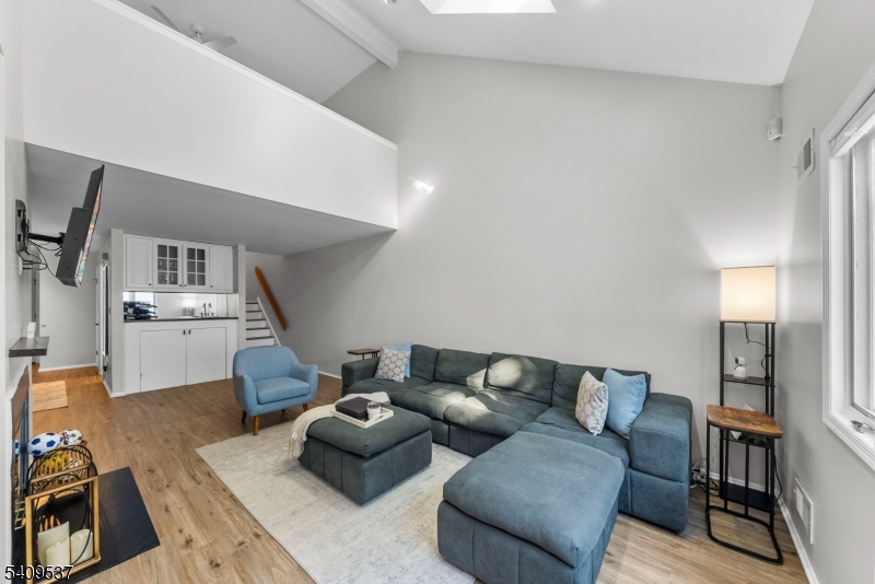 23 Bayowski Road West Orange, NJ 07052 - Photo 16 of 38 a living room with furniture and view of kitchen