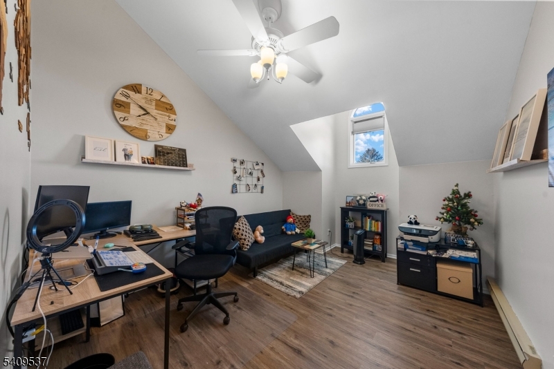 23 Bayowski Road West Orange, NJ 07052 - Photo 21 of 38 a living room with furniture and wooden floor