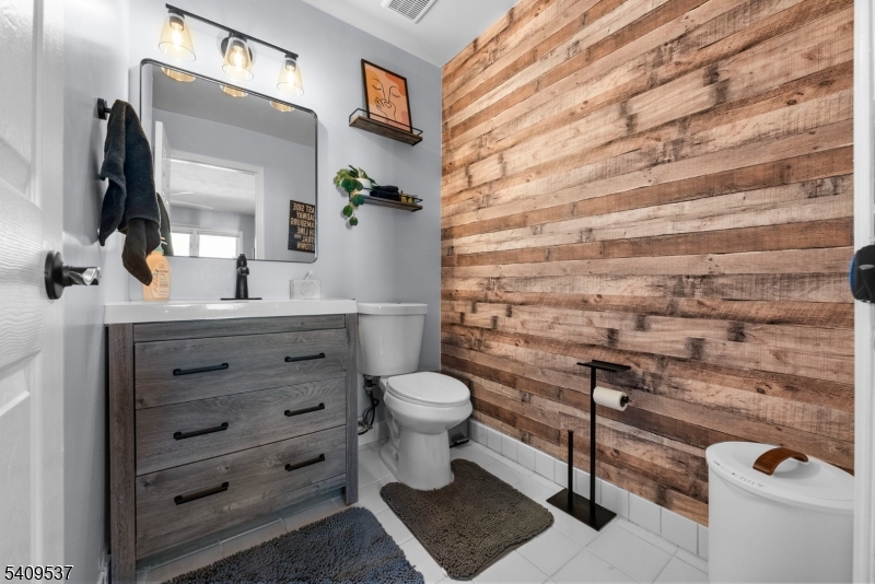 23 Bayowski Road West Orange, NJ 07052 - Photo 23 of 38 a bathroom with a toilet and a sink