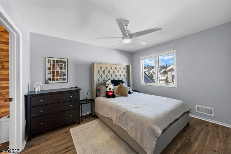 23 Bayowski Road West Orange, NJ 07052 - Photo 25 of 38 a bedroom with a bed and a window