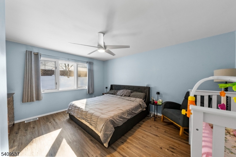 23 Bayowski Road West Orange, NJ 07052 - Photo 30 of 38 a bedroom with a bed and a window