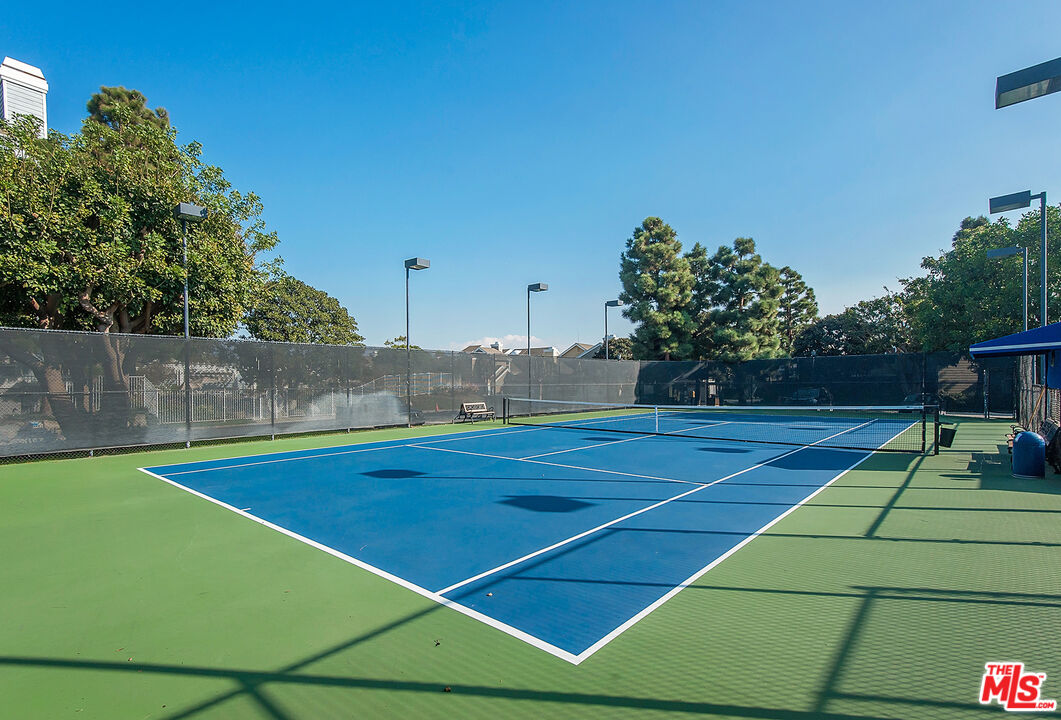 13080 Mindanao Way, Unit 95 Marina del Rey, CA 90292 - Photo 3 of 11 a view of an outdoor space and tennis court