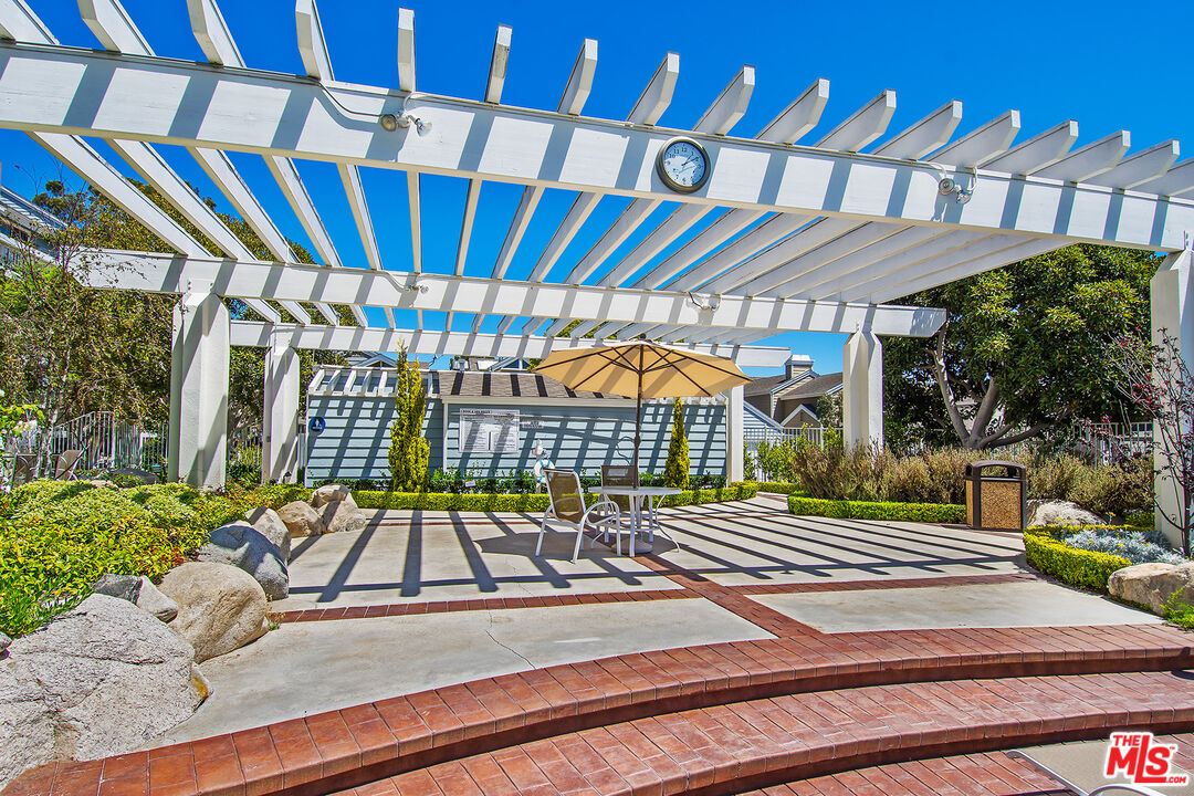 13080 Mindanao Way, Unit 95 Marina del Rey, CA 90292 - Photo 7 of 11 a view of a brick house with many windows