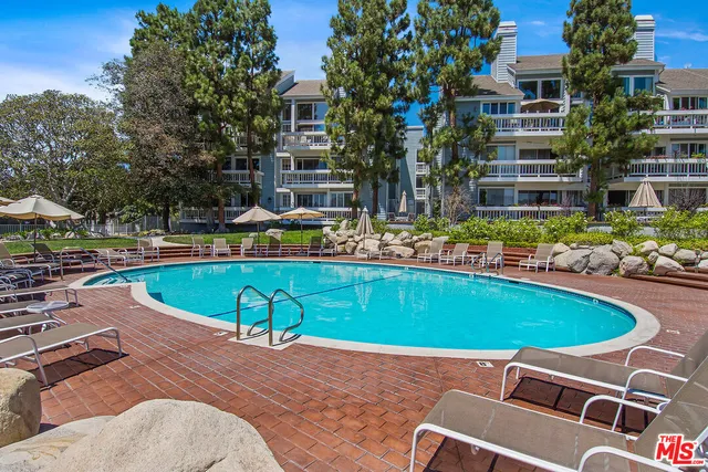 a view of outdoor sitting area with chairs