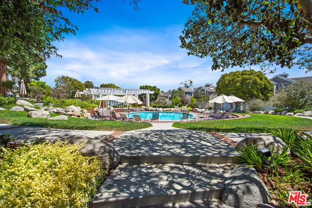 a view of a street with a houses