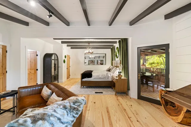 a bathroom with a bathtub and shower