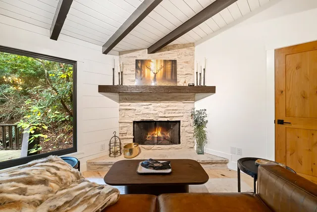 a bathroom with a sink a mirror and a shower