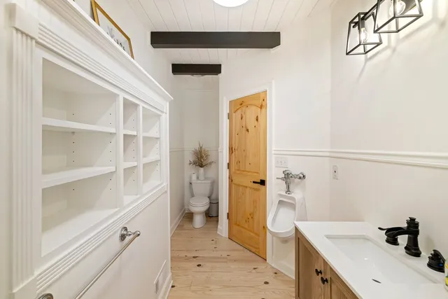 a view of a porch with wooden floor and outdoor space