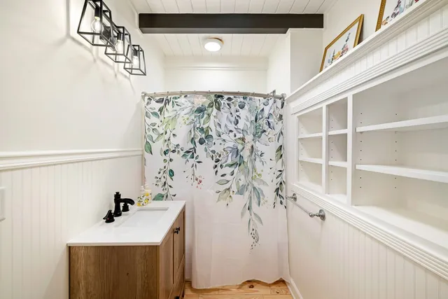 a view of balcony with wooden floor