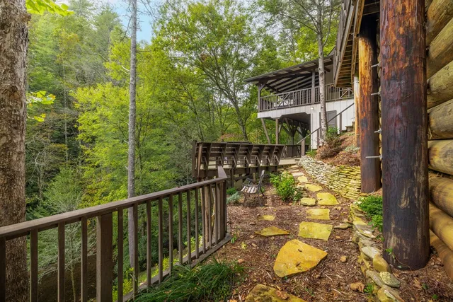 a view of a yard with trees