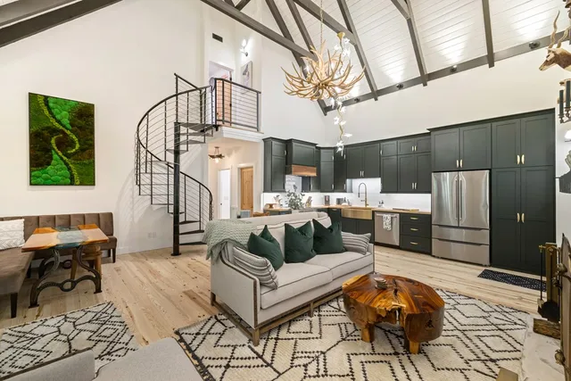 a living room with a couch and a table