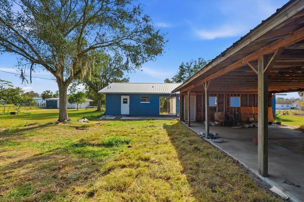 54 Gardner Avenue Lake Wales, FL 33898 - Photo 21 of 25 a view of a house with a yard