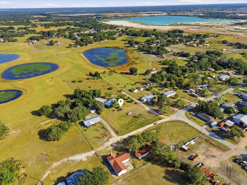 54 Gardner Avenue Lake Wales, FL 33898 - Photo 25 of 25 an aerial view of residential houses with outdoor space