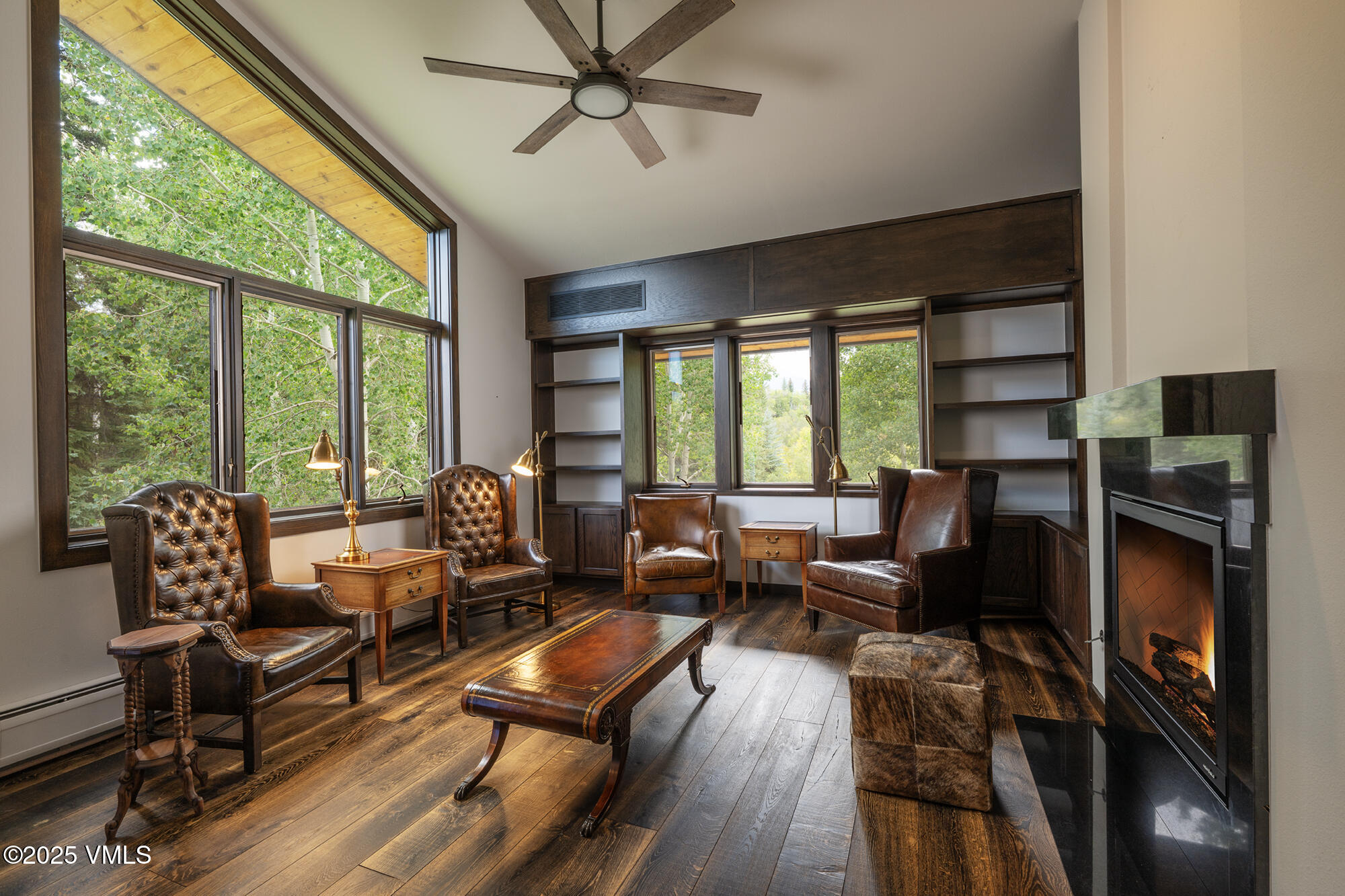 304 Meadow Road Edwards, CO 81632 - Photo 12 of 25 a living room with furniture fireplace and a large window