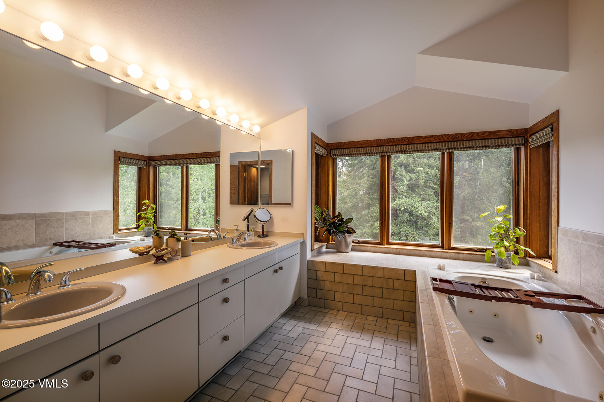 304 Meadow Road Edwards, CO 81632 - Photo 14 of 25 a large kitchen with a large window and a sink