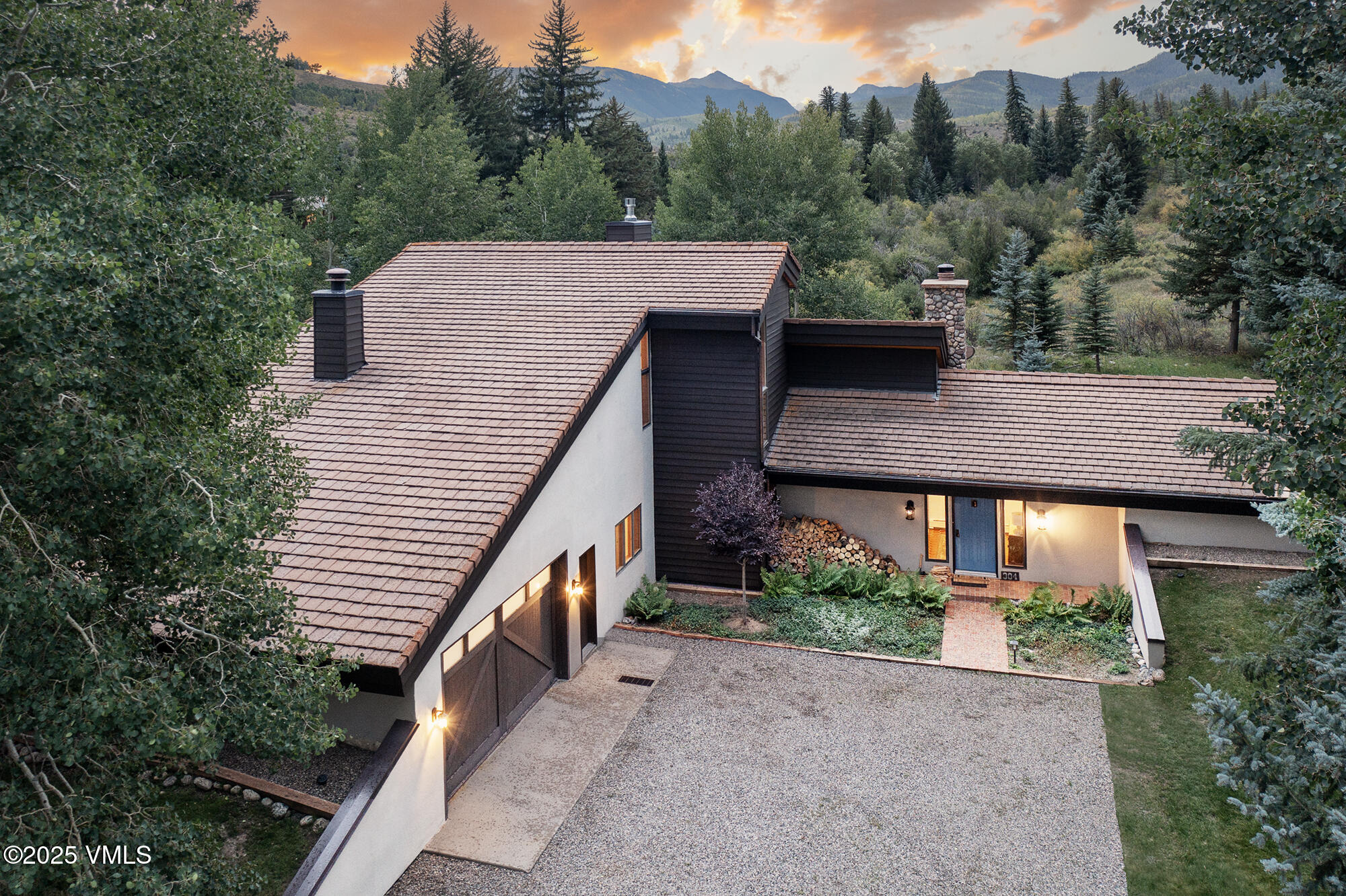304 Meadow Road Edwards, CO 81632 - Photo 18 of 25 an aerial view of a house with a yard