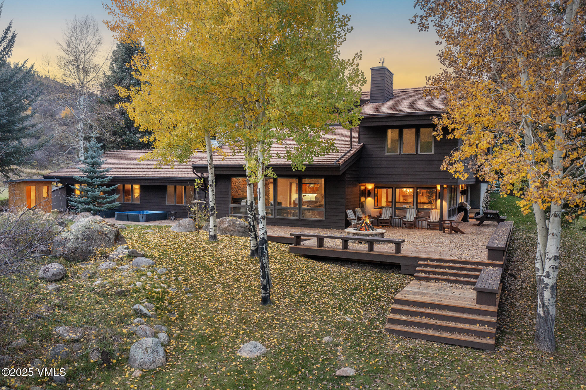 304 Meadow Road Edwards, CO 81632 - Photo 2 of 25 a front view of a house with a yard