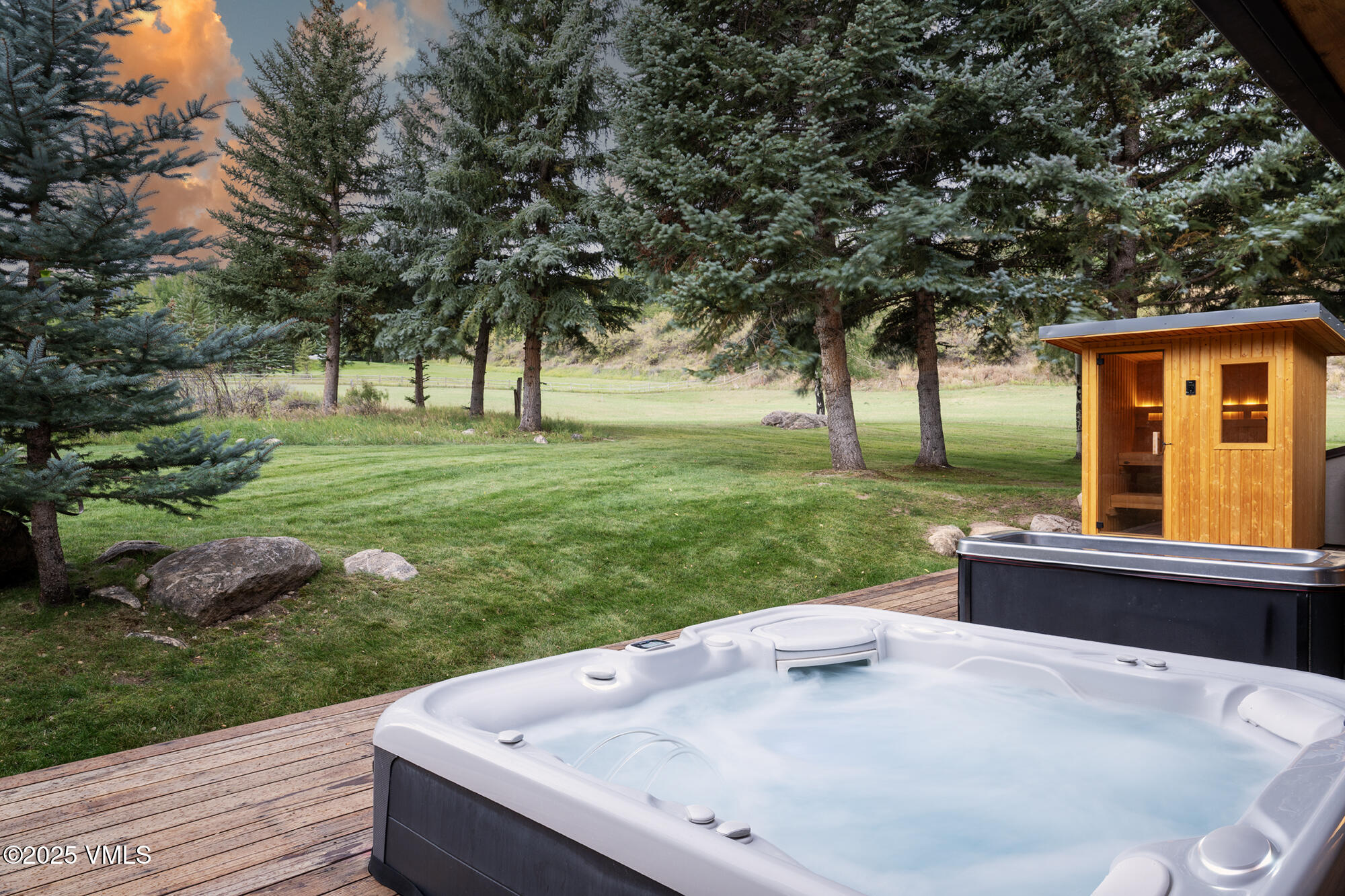 304 Meadow Road Edwards, CO 81632 - Photo 7 of 25 a view of a backyard with a garden and entertaining space