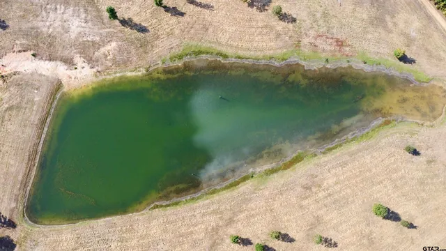 a view of a lake from a balcony
