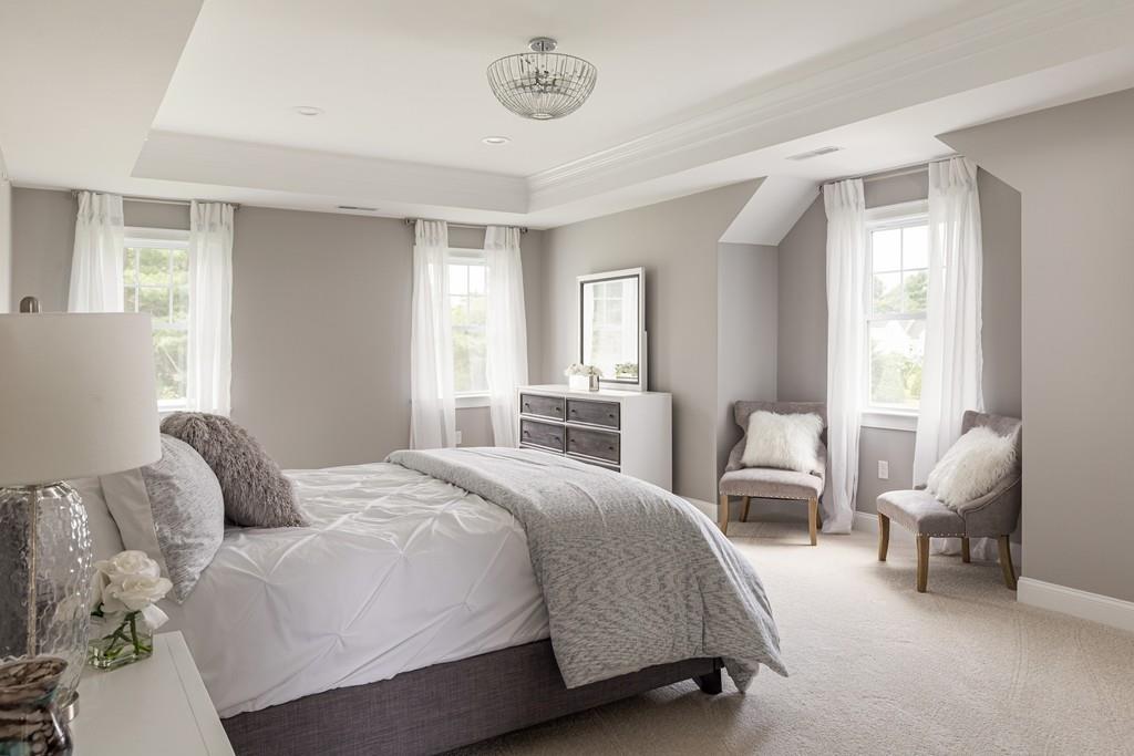 7 Summit Pointe Drive Holliston, MA 01746 - Photo 14 of 24 a bedroom with a bed and a couch