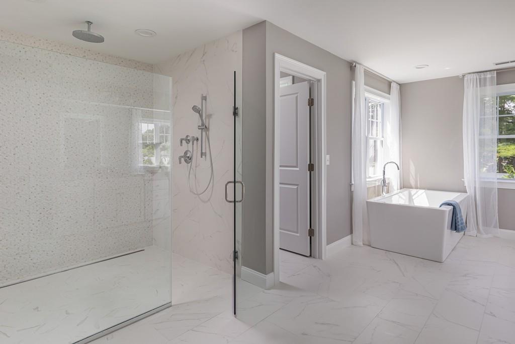 7 Summit Pointe Drive Holliston, MA 01746 - Photo 17 of 24 a bathroom with a bathtub shower and toilet