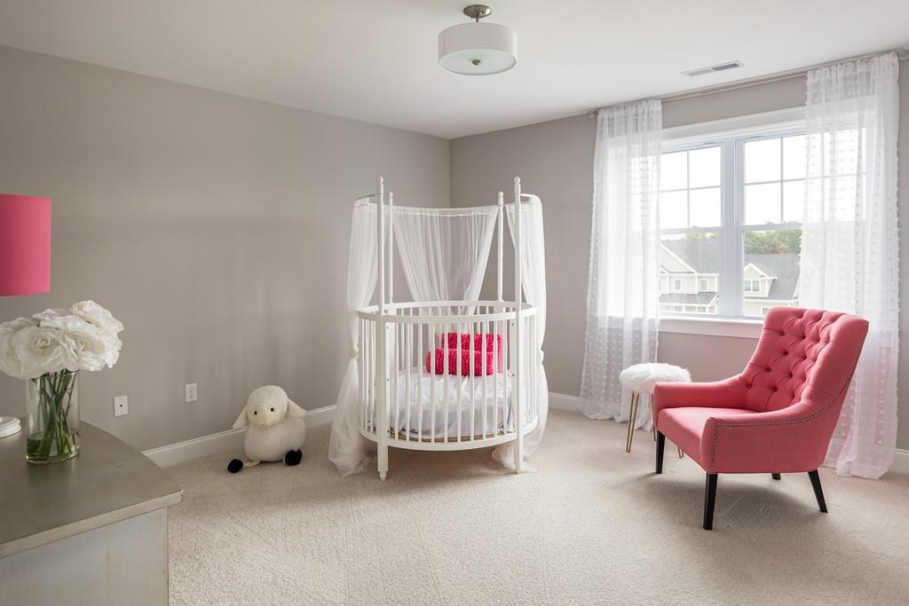 7 Summit Pointe Drive Holliston, MA 01746 - Photo 24 of 24 a living room with furniture and a large window