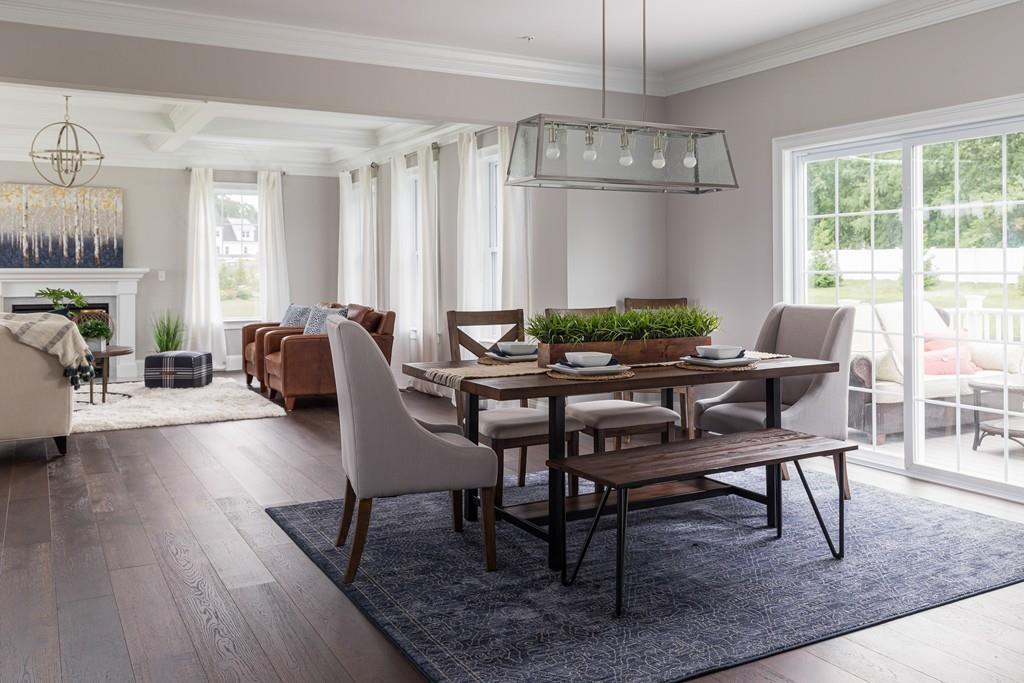 7 Summit Pointe Drive Holliston, MA 01746 - Photo 5 of 24 a view of a livingroom with furniture window and wooden floor