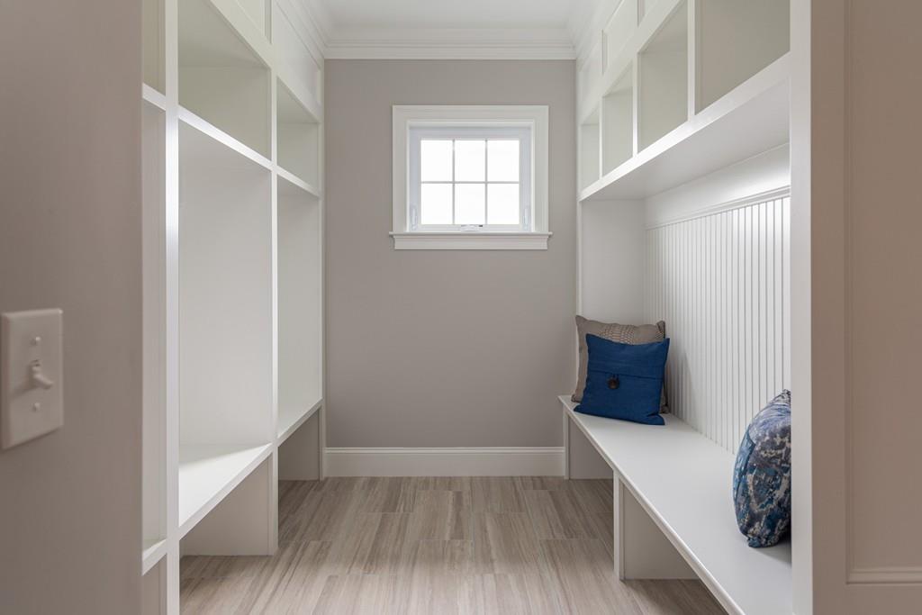 7 Summit Pointe Drive Holliston, MA 01746 - Photo 9 of 24 a view of an empty room with wooden floor and a window