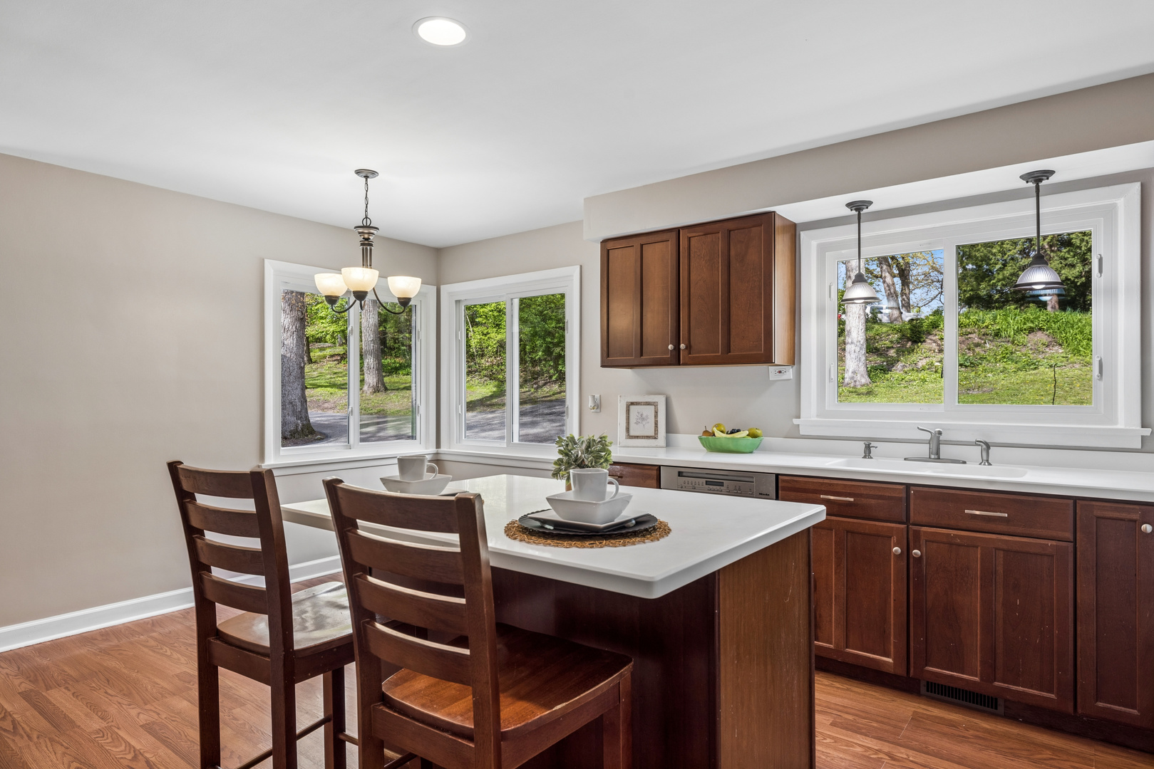 809 Ridgeland Street Fox River Grove, IL 60021 - Photo 16 of 50 a kitchen with a sink and wooden cabinets