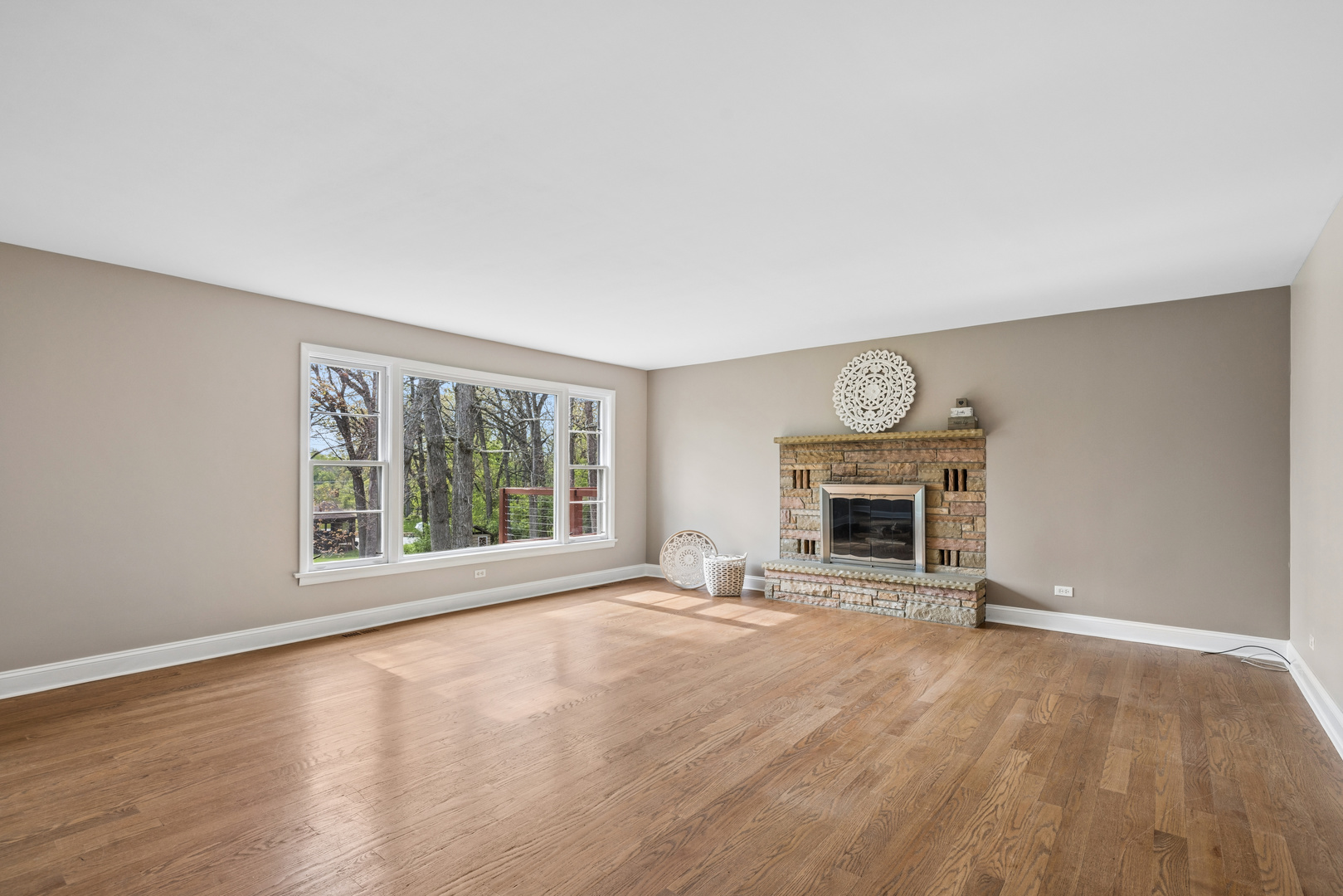 809 Ridgeland Street Fox River Grove, IL 60021 - Photo 20 of 50 a view of an empty room with a fireplace and a window