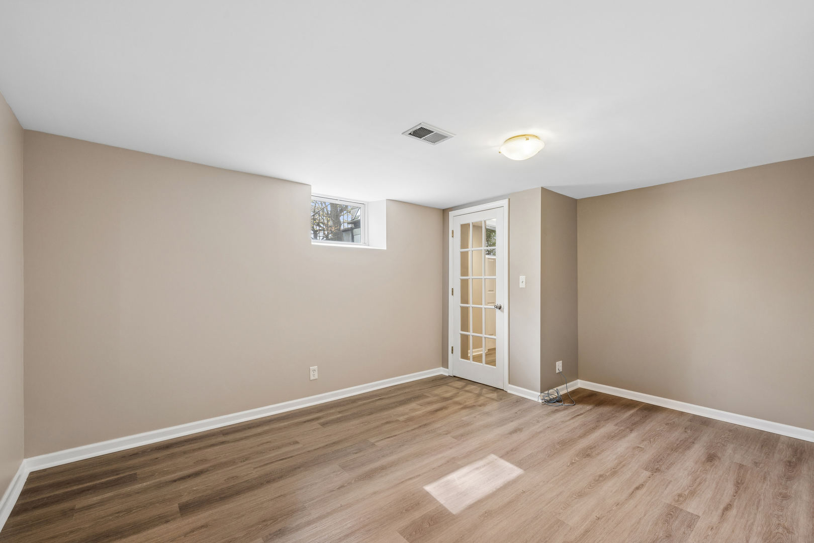 809 Ridgeland Street Fox River Grove, IL 60021 - Photo 28 of 50 a view of an empty room with wooden floor