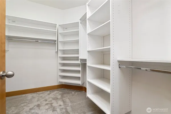 a view of an empty walk in closet
