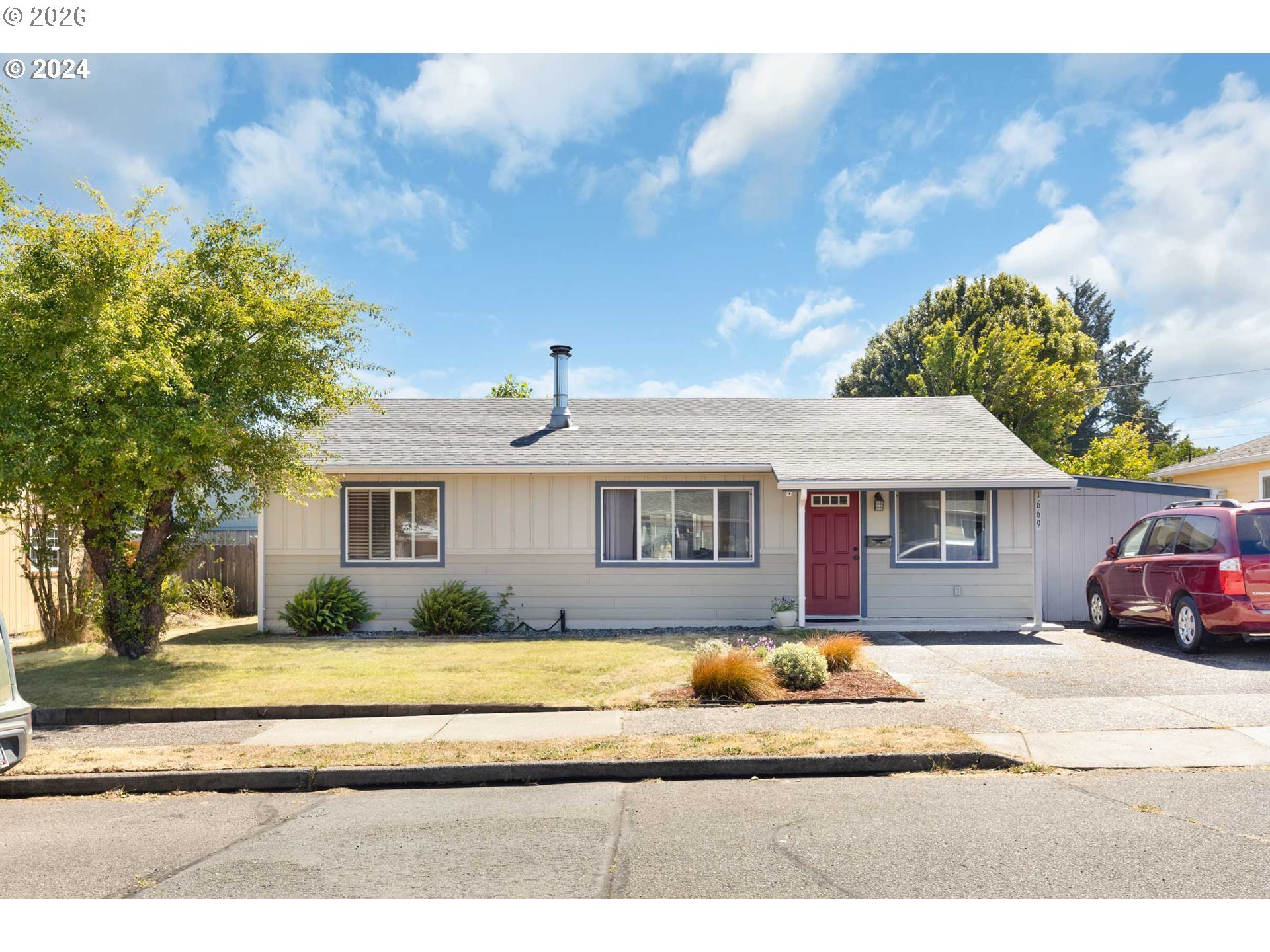 1669 Hayes Street North Bend, OR 97459 - Photo 12 of 30 a front view of a house with a yard
