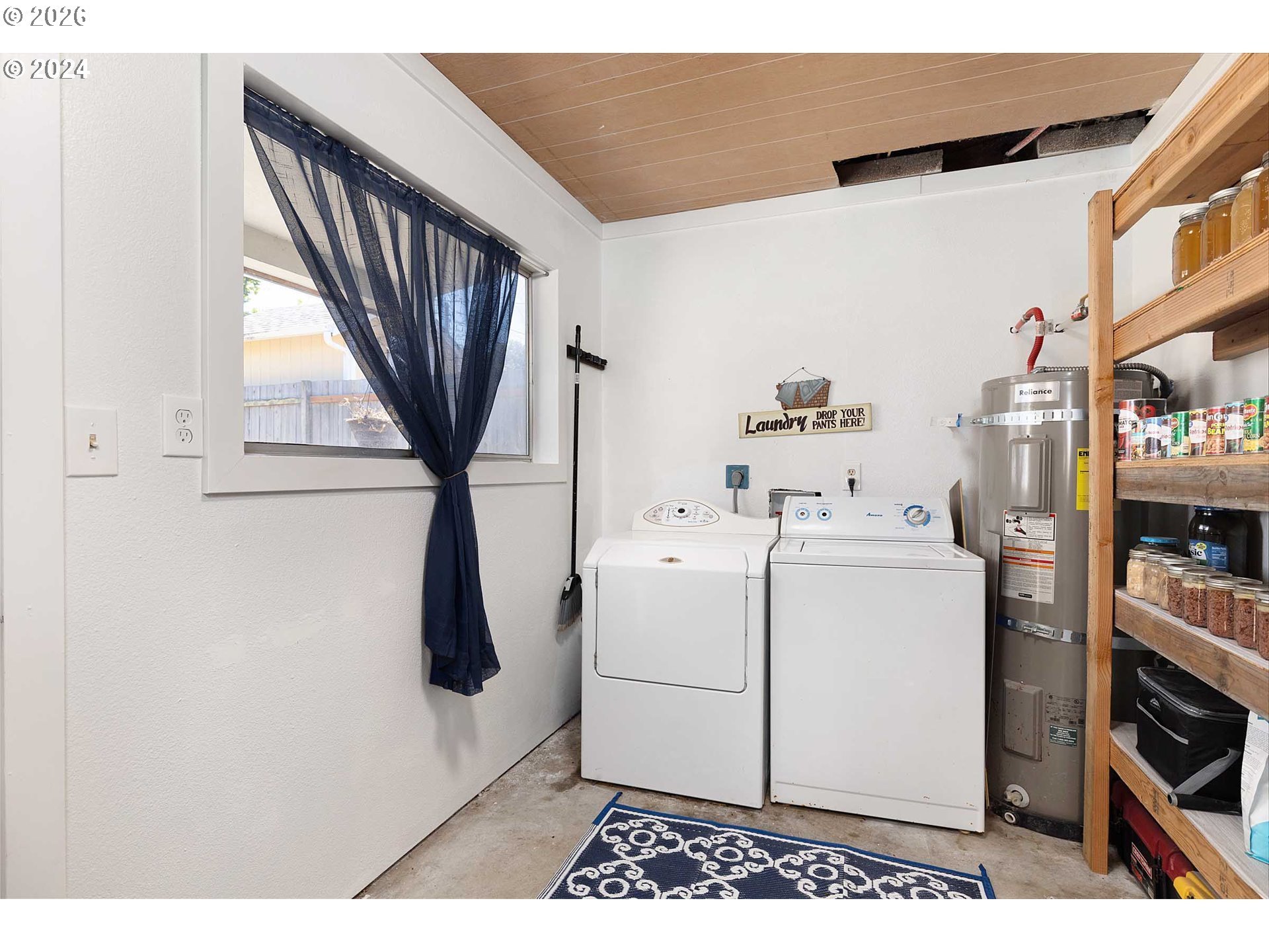 1669 Hayes Street North Bend, OR 97459 - Photo 17 of 30 a utility room with dryer and washer
