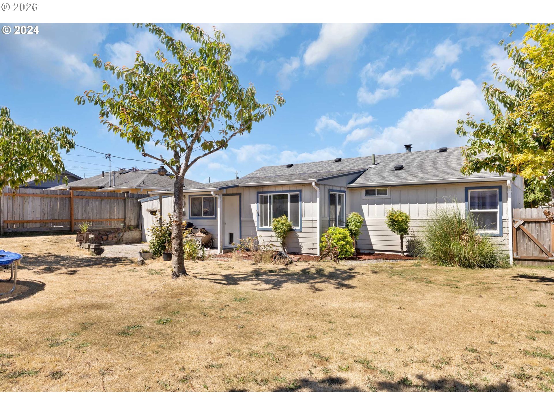 1669 Hayes Street North Bend, OR 97459 - Photo 19 of 30 a front view of a house with patio
