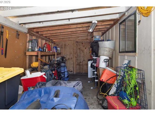 a view of a livingroom with furniture and a flat screen tv