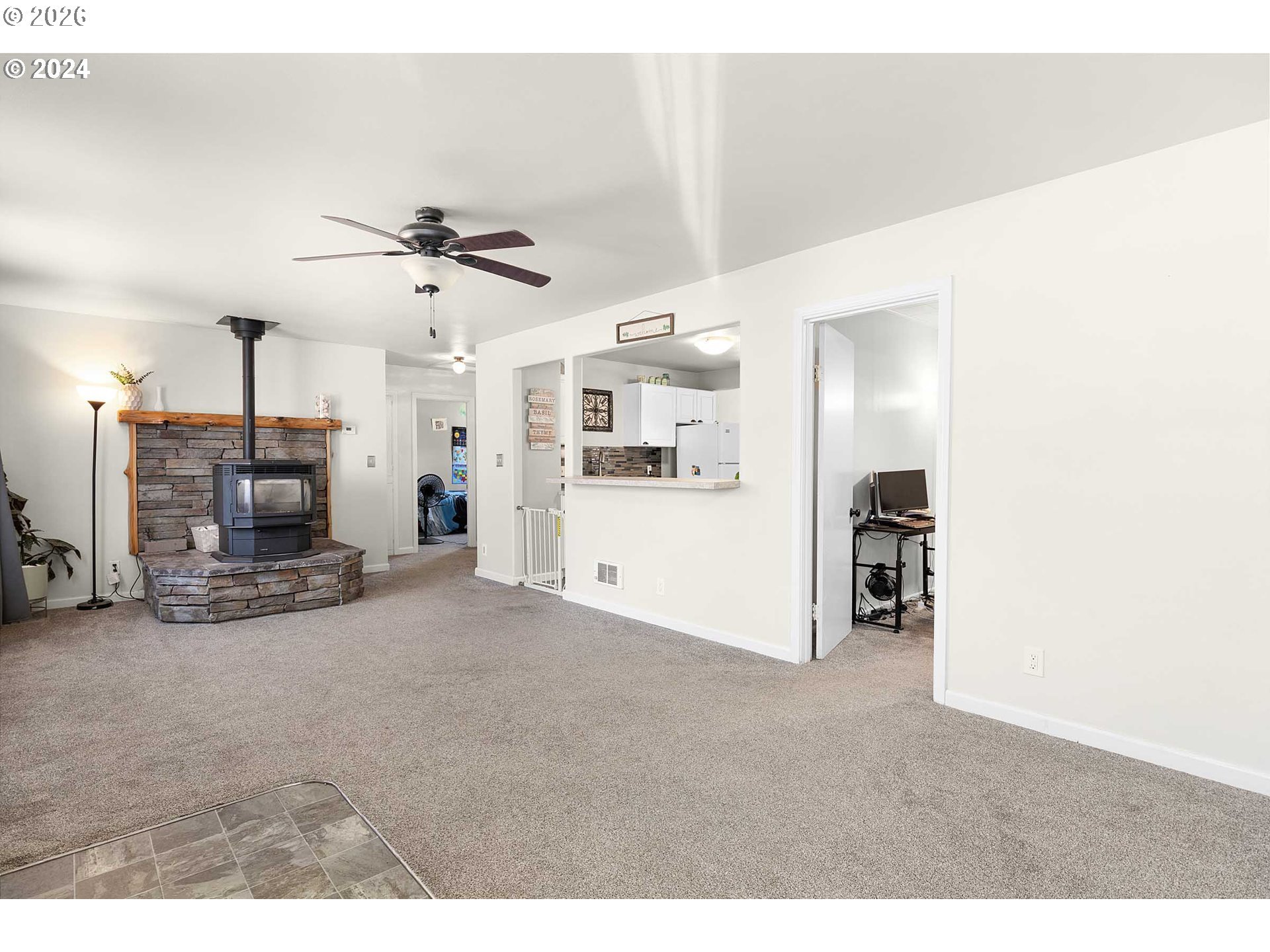 1669 Hayes Street North Bend, OR 97459 - Photo 28 of 30 a view of a livingroom with furniture and a kitchen view