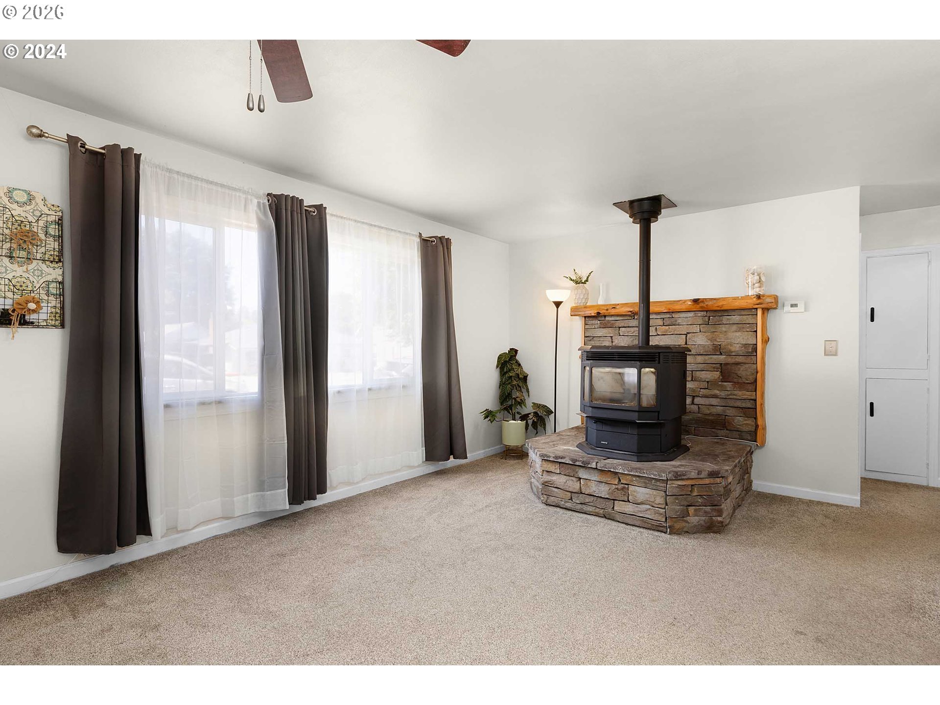 1669 Hayes Street North Bend, OR 97459 - Photo 29 of 30 a living room with furniture and a fireplace
