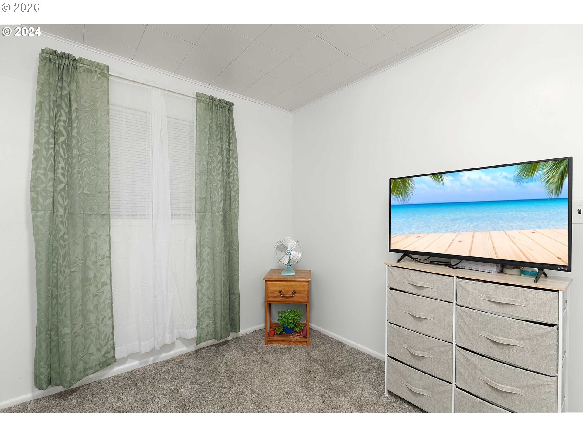 1669 Hayes Street North Bend, OR 97459 - Photo 6 of 30 a living room with a bed and furniture