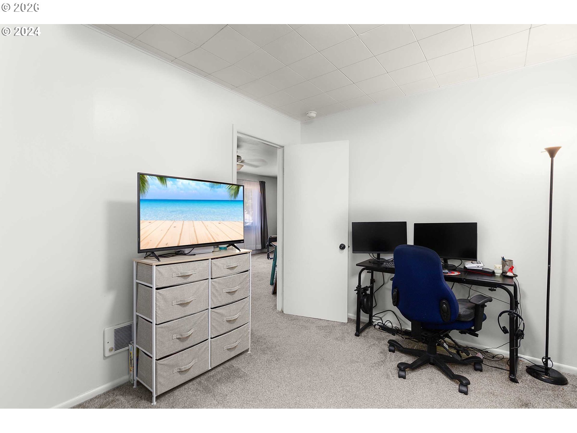 1669 Hayes Street North Bend, OR 97459 - Photo 7 of 30 a living room with furniture and a flat screen tv