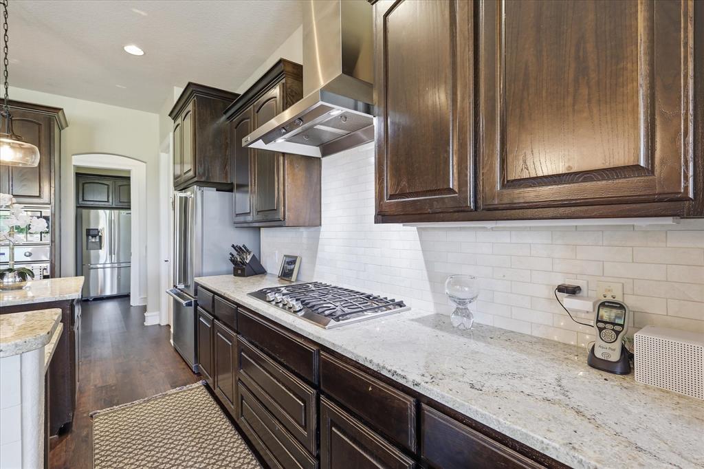 4920 Peden Road Fort Worth, TX 76179 - Photo 8 of 40 Large Kitchen with Updated Lighting, Viking Appliances, and Granite Countertops.