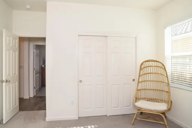 a room with a chair and a table