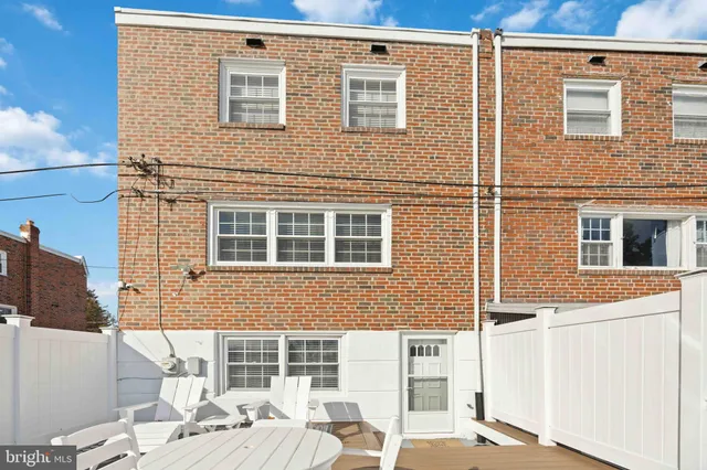 a view of a building with a window and door