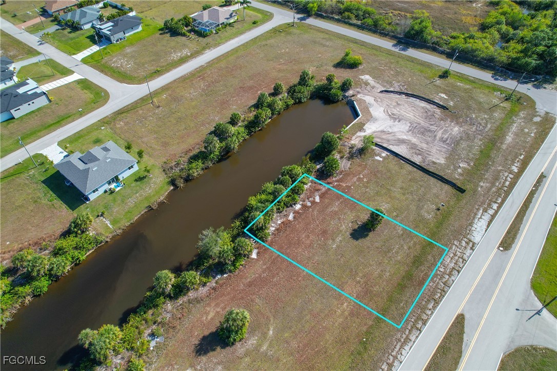 3803 Old Burnt Store Road North Cape Coral, FL 33993 - Photo 2 of 12 an aerial view of a house