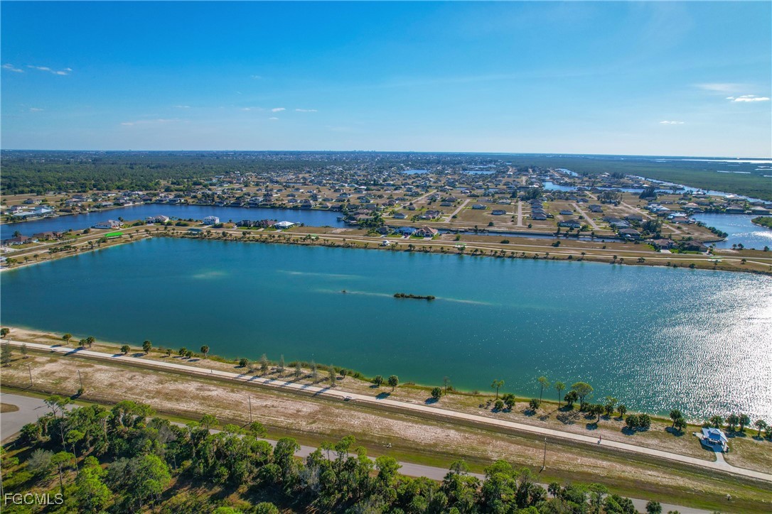 3803 Old Burnt Store Road North Cape Coral, FL 33993 - Photo 9 of 12 an aerial view of a city