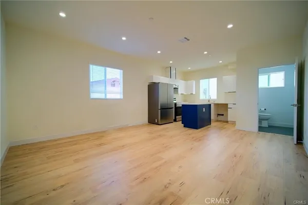 a view of kitchen and a window