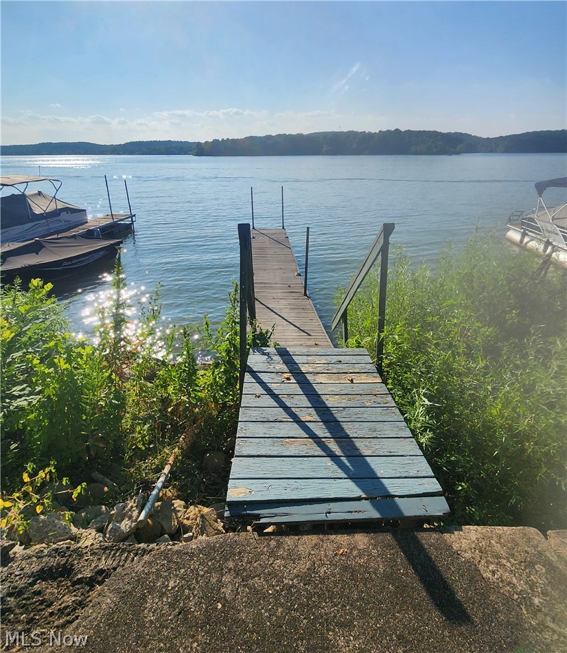2873 Lodge Road Southwest Sherrodsville, OH 44675 - Photo 12 of 50 Private dock for your nautical toys to explore Atwood Lake and its 28 miles of shoreline.
